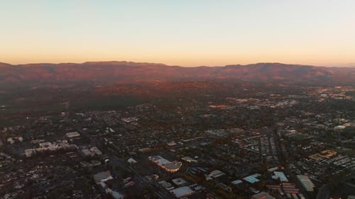 Gorgeous Napa valley at sunset. Beautiful mountains lit with last rays of setting sun at backdrop.