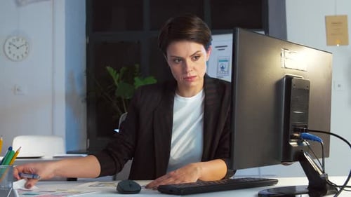 Business, Technology and People Concept - Ui Designer with Smartphone with Templates