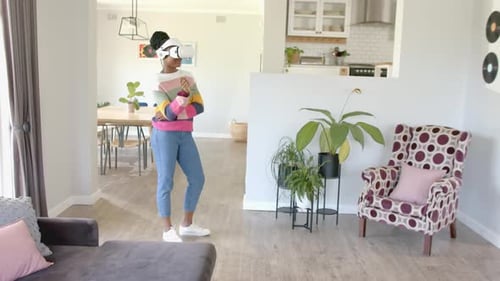 Woman Using Virtual Reality Headset in Modern Home