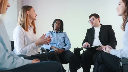 Business Team Meeting Together in a Circle