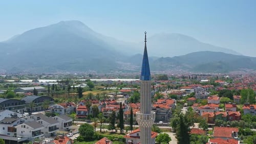 Aerial View of Fethiye City in Turkey Camera Slowly Rotating Around a Mosque Minaret