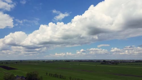Aerial view of moving clouds and green landscape at Amersfoort, The Netherlands