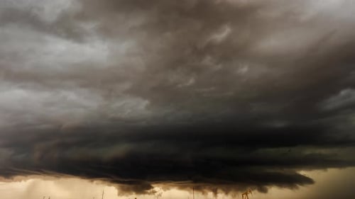 Ominous Storm Clouds Rolling Across the Horizon