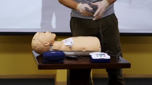 Defibrillator Training with Medical Mannequin