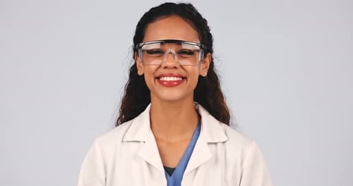 Science, research and smile with face of woman in studio for medicine, pharmacy or chemistry