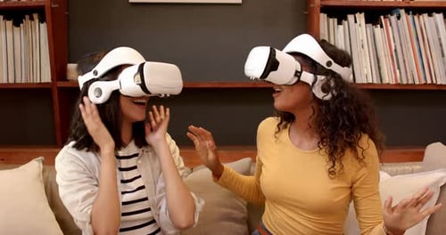 Friends Enjoying Virtual Reality at Home