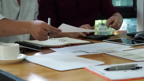 Businessmen financial inspector and secretary calculating balance. Internal Revenue Service inspecto