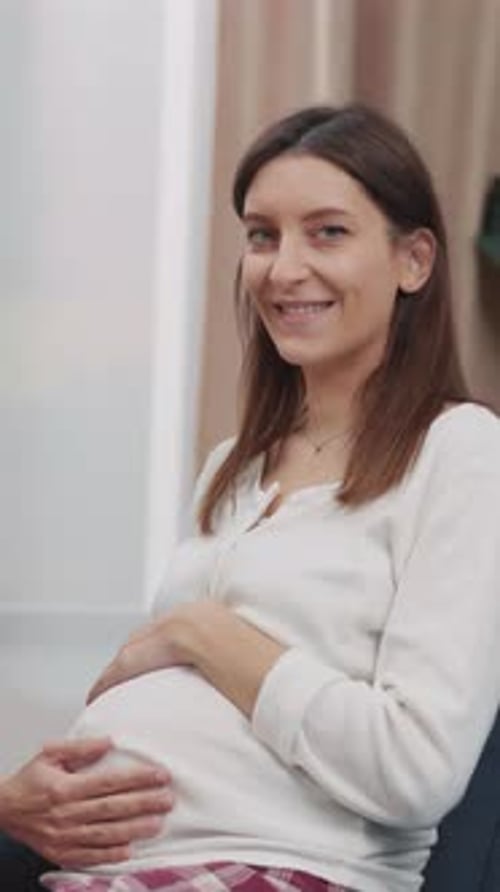 Portrait Cheerful Young Caucasian Pregnant Woman Expecting Child Touching and Embracing Gently Her