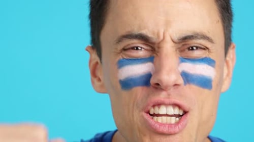 Close Up of a Man Supporting Salvadoran Team