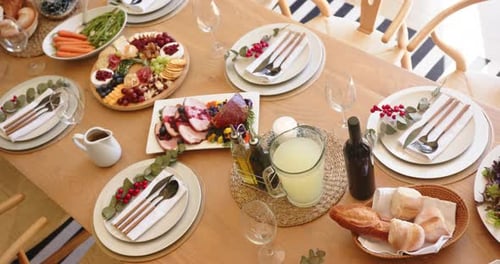 Festive Holiday Dinner Table Set With Abundant Food and Decorations