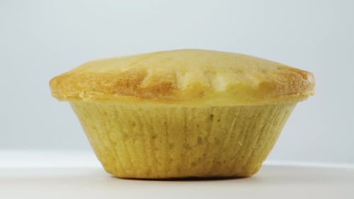 Cherry mini pie close-up. Rotates on a white background.