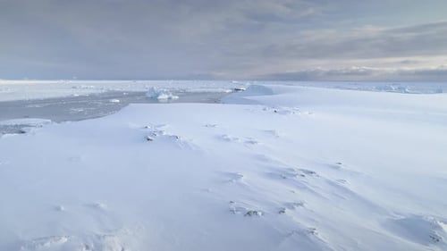 Infinitely Endless Polar Snowy Desert in Antarctica Frozen Iceberg