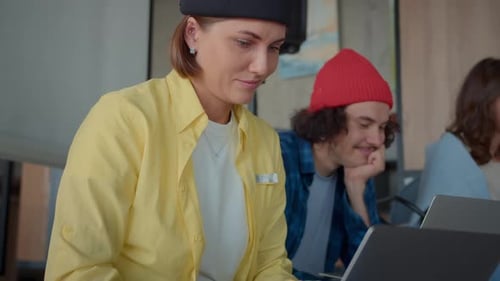 Diverse People Working on Laptops in an Office
