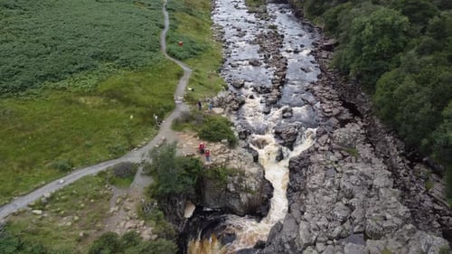 High Force , waterfall Lake District Cumbria UK Aerial pull back reveal footage 4K Summer 2021