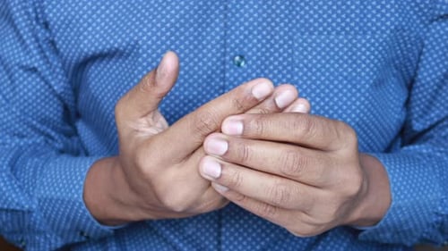 Man Suffering Pain in Hand Close Up