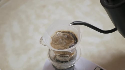Pouring Hot Water to Brew Coffee