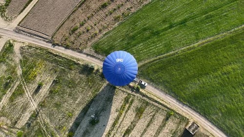 Hot Air Balloons Fly Over the Mountainous Landscape of Cappadocia Turkey