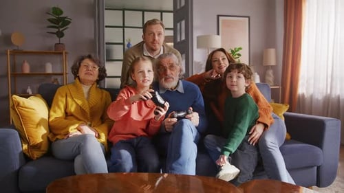 Family Playing Video Games Together on Couch
