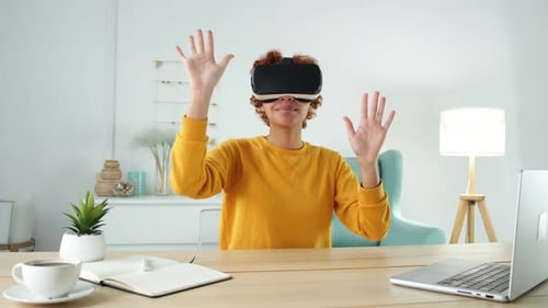 Woman Using VR Headset in Modern Home Setting
