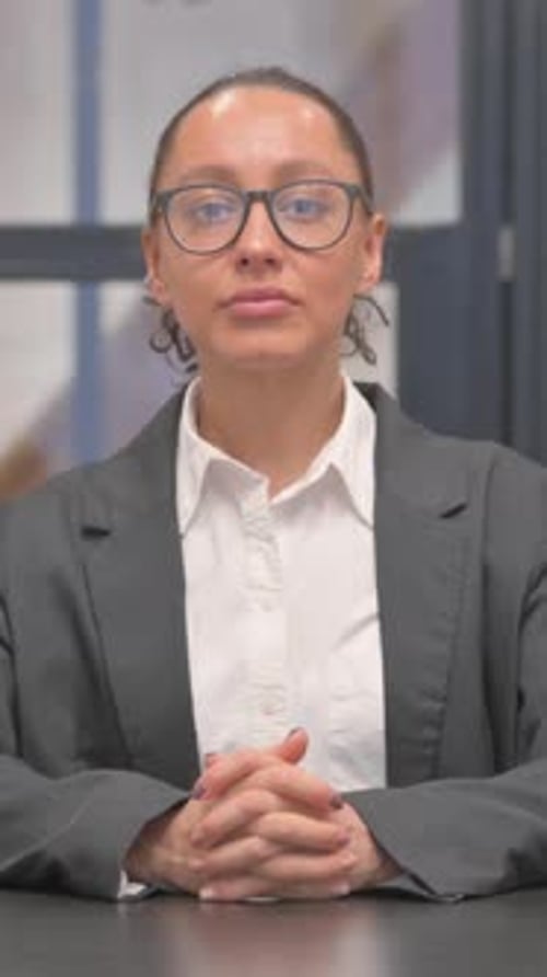 Mixed Race Business Woman Brainstorming New Work Plan, vertical video