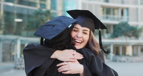 Graduation, friends hug and excited students in celebration of ...