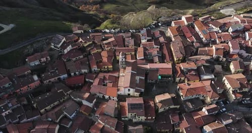 Aerial view of town with red roofs, Italy.