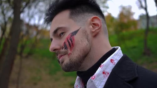 Mans Stylish Back Profile in Nature Vibrant Green Backdrop Contemporary Fashion Relaxed Vibe
