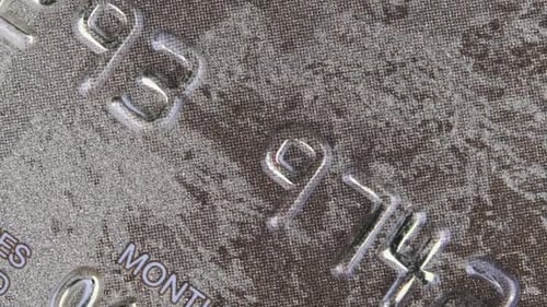 Plastic Credit Card Rotates Close Up