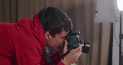 Happy Guy Photographer Professional Shoots Model in Studio Behind the Scenes