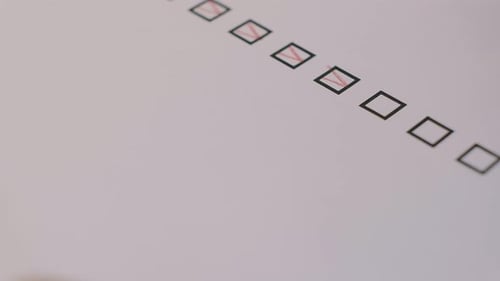 Completing Checkboxes on a White Form with Pencil