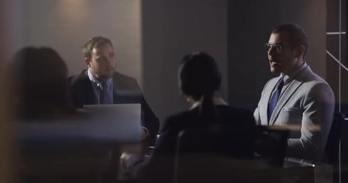 Business Professionals in Modern Office Having Meeting