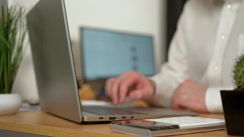 Man Working in Office Open Laptop Computer on Desk Close Up