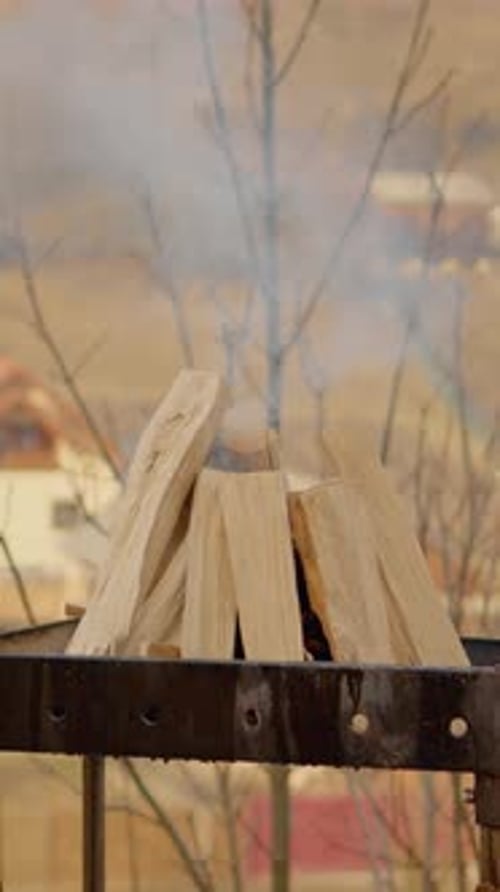 Campfire Starting with Wood and Smoke