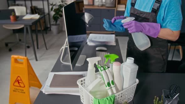 Female Cleaner Spraying Detergent on Rag Wiping Computer Screen at ...
