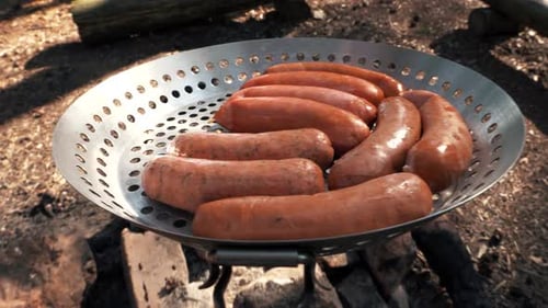 Sizzling Sausages Cooking Outdoors