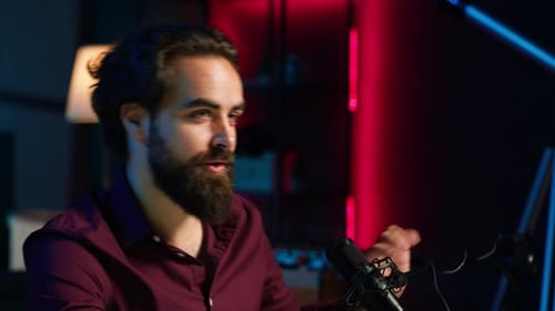 Close Up of Content Creator Using Mic in Studio to Do ASMR Video