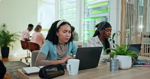 Young Adults Working Together in Bright Modern Office