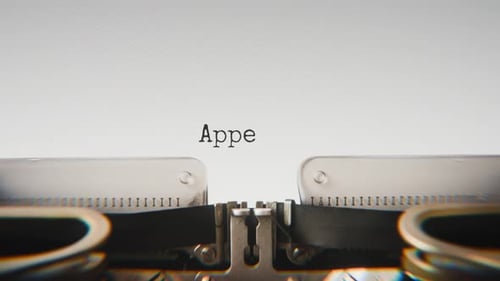 Old mechanical typewriter typing Appeal Denied in a close-up view.