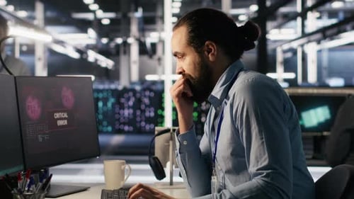 Engineer in Data Center Frustrated By Critical Error Popup on Monitor