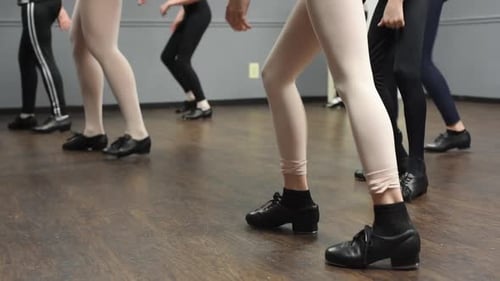Tap dance class feet in studio.