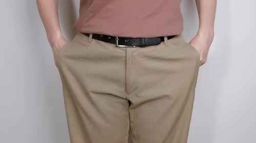 Person Showing Empty Pockets Close Up