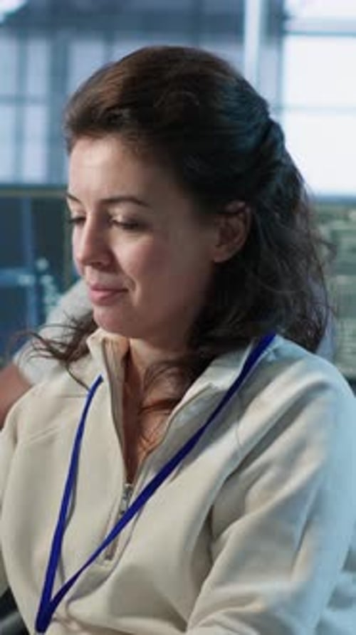 Joyful Technician Working in High Tech Data Center Workspace