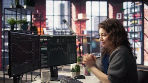 Joyful Thrilled Woman Works on Stock Trading Analysis Browsing Real Time Data
