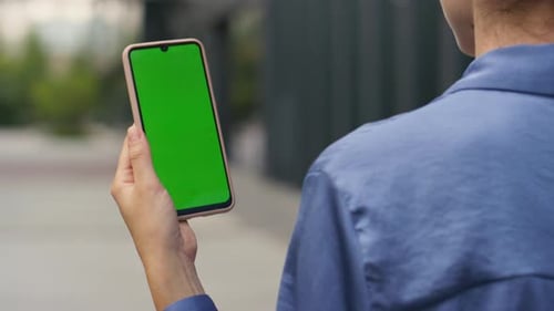 Hand Holding Mockup Smartphone on Street Closeup Businesswoman Walking City