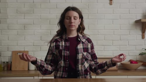 Woman Meditating Mindfully in Bright Kitchen, Zen Moment