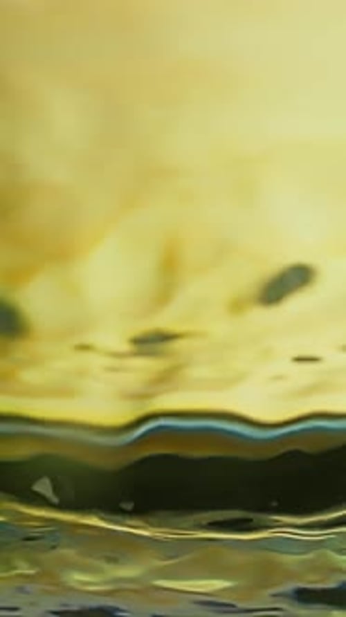 Abstract liquid reflections creating unique fluid patterns