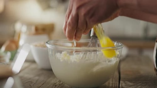 Baking sheet. The expectant mother prepares homemade cakes in the kitchen. A diet-conscious girl