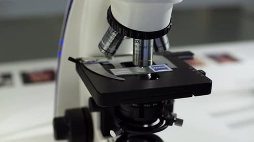 Close Up of Scientific Microscope in Workplace