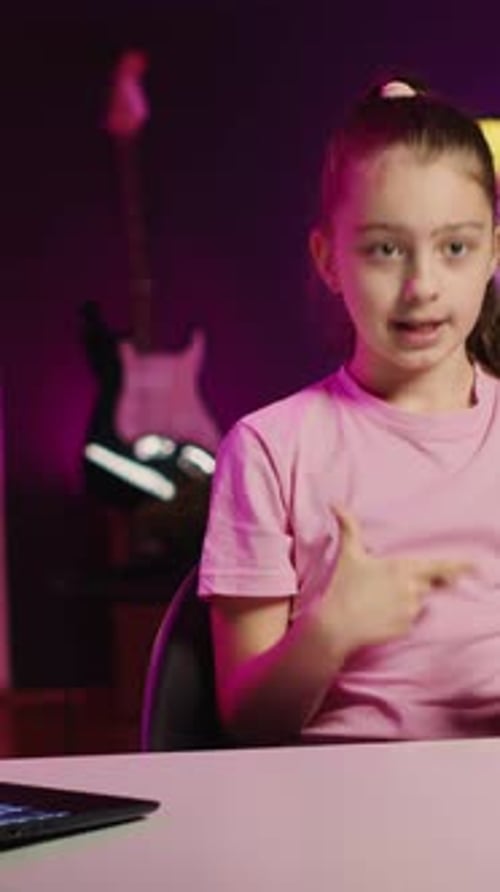 Child Vlogger Records Video at Home