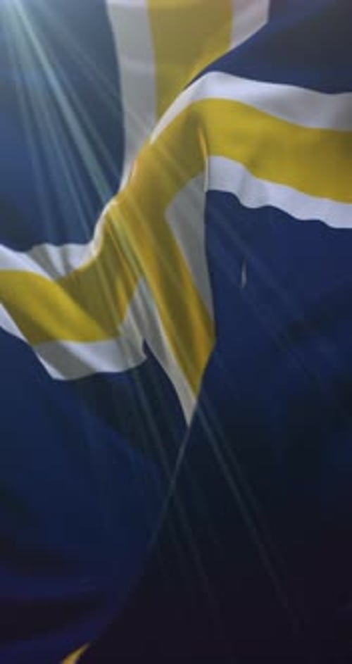 Vertical Nordic Cross Flag Waving with Lens Flare